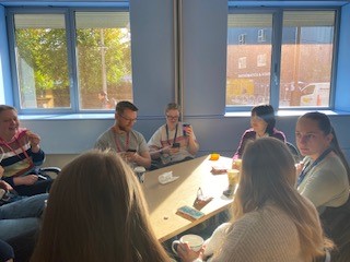 Image of people drinking coffee