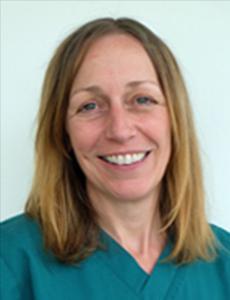 Headshot of Nicola Brannan wearing green scrubs