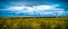 A photo of wind turbines at a wind farm