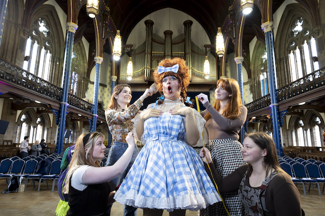 Johnny McKnight prepares to deliver the 2024 Cameron Lecture, The Panto Dame (She's Behind You), dressed in full panto dame regalia and channelling one of his favourite characters, Dorothy Blawna-Gale