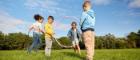 An image of four children playing outdoors