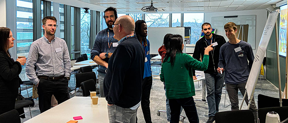 Academics and industry professionals discussing in two groups