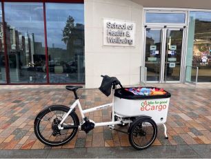 A photo of the Byres Community Hub foodbank contribution in a bike cargo