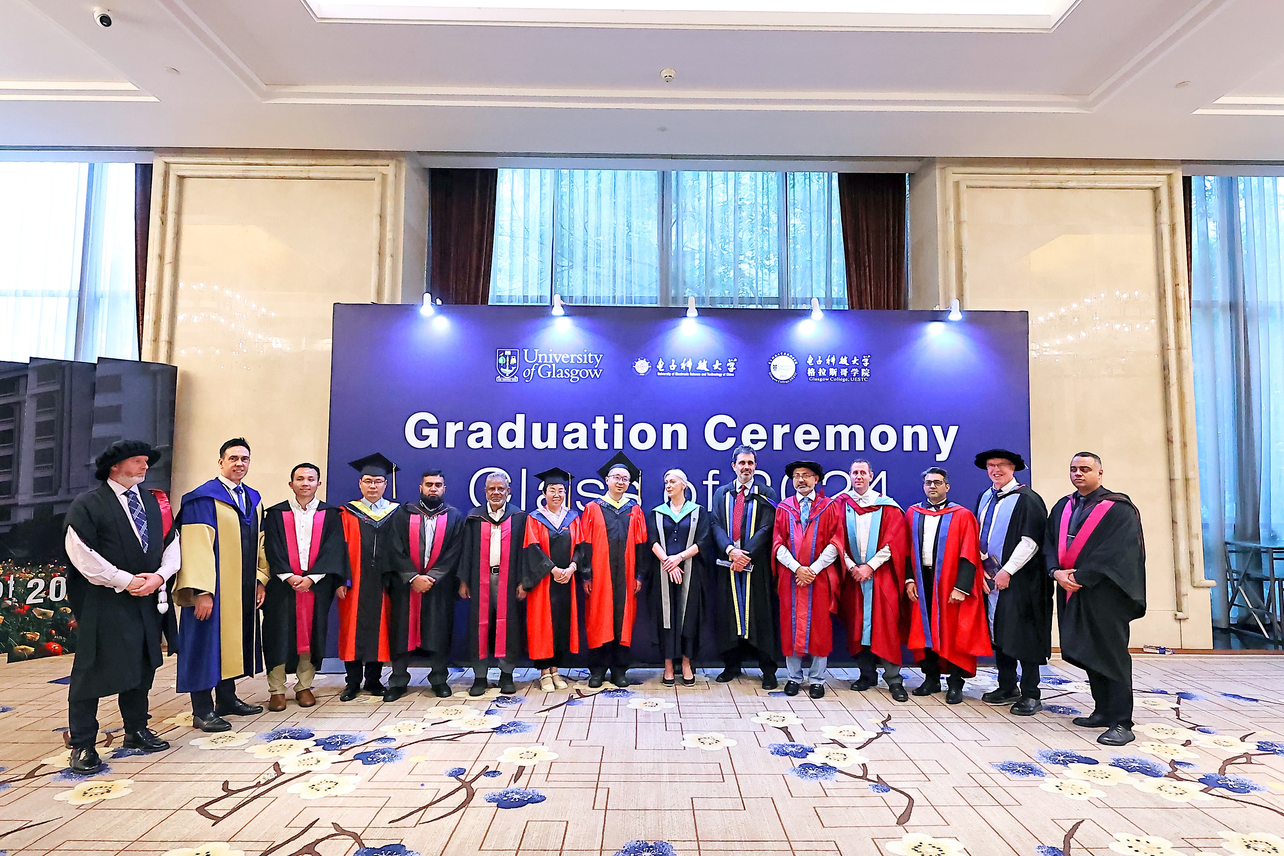 Glasgow College UESTC staff pose prior to the 2024 Joint Graduation Ceremony