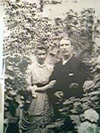 Eliza and James Paterson in formal dress in conservatory in Kilniess, Moniaive, probably soon after their wedding, 24 April 1884. (MS Paterson EU3) - Links to book of the month article