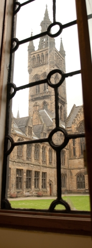 View of tower through a window from inside