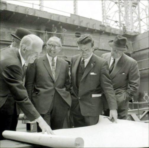 The Cunard visitors scrutinising the plans during their visit.