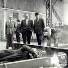 The welders demonstrating their skills to the Cunard visitors.