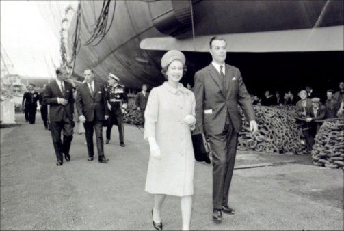 Her Majesty walks by the new ship.