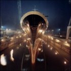 The beauty of a well designed ship, the QE2 at night.