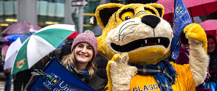 Alumni Officer Stephanie Edwards and Gus the mascot