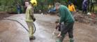 University of Glasgow archaeologists are helped with the excavation at the Cochno Stone by local firefighter 2016