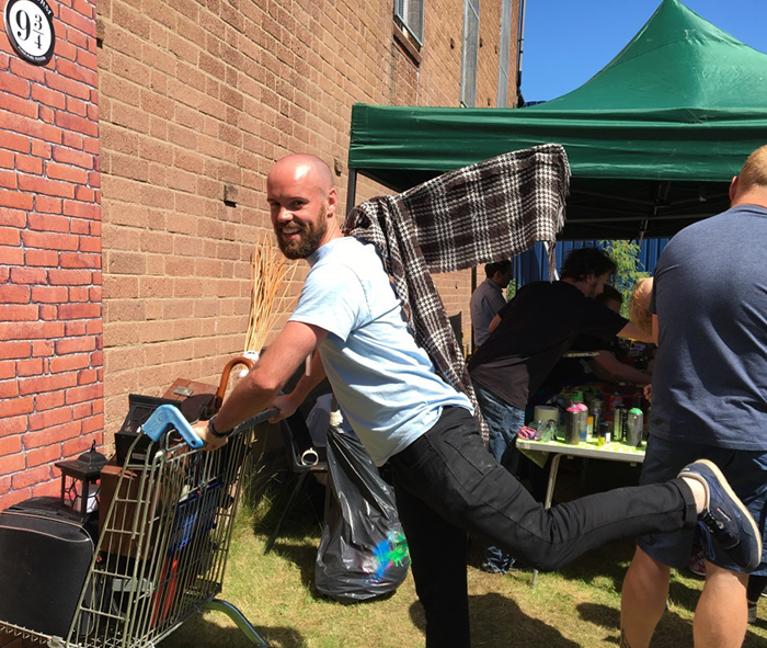 GSF staff depart through platform 9 3/4 on our model luggage trolley