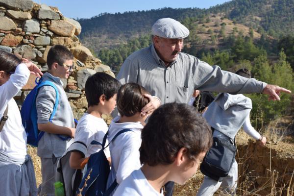 Panayiotis Alexandrou Loppas and pupils from Asinou Regional Primary School at Asinou Village (photo by Tracy Ireland)