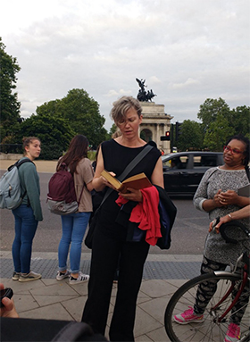 woman reading at event