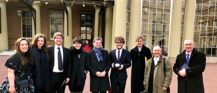 Queen's Anniversary Prize Full Team outside of Buckingham Palace after receiving their prize for the Historical Thesaurus of English