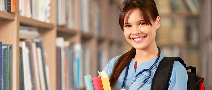 Image of post graduate nurse in library