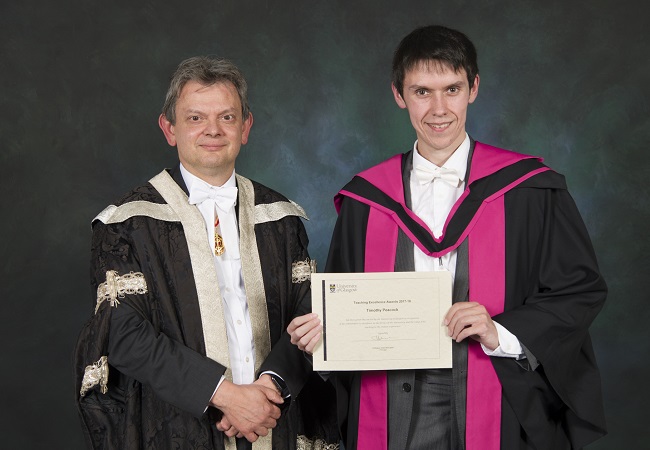 Dr Timothy Peacock receiving his Teaching Excellence Award 