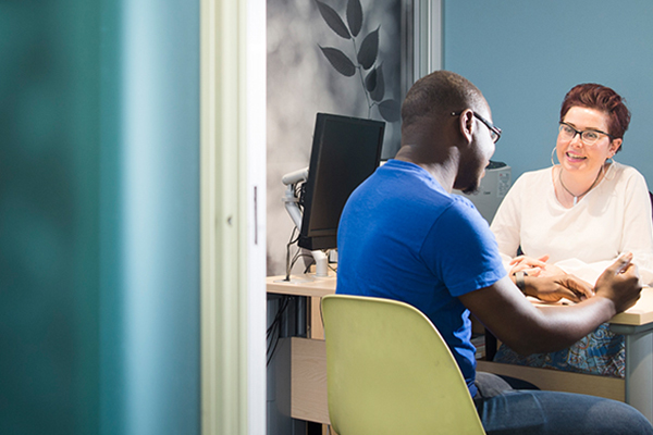 A student is interviewed in the Fraser Building