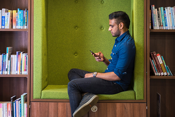 A student sits in the Library