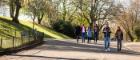 Students walking in park