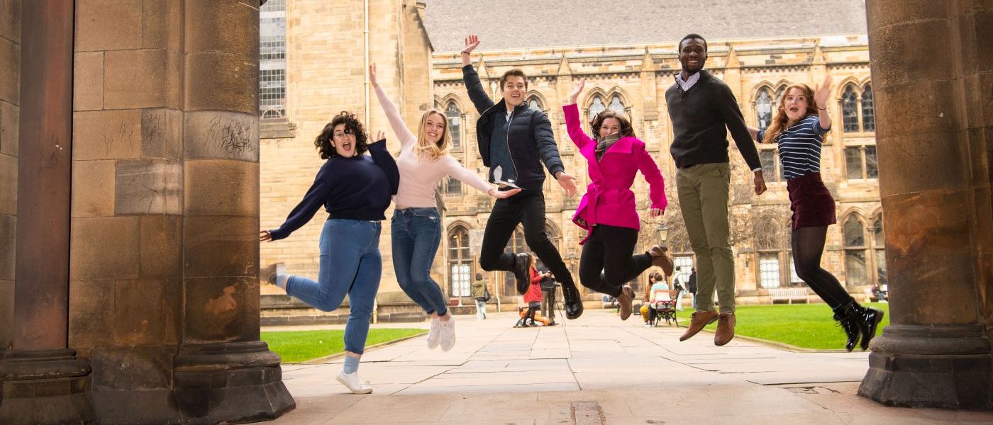 6 students jumping in south front 