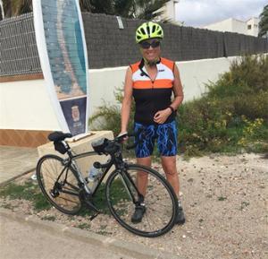 Photo of Professor Jill Pell on bike