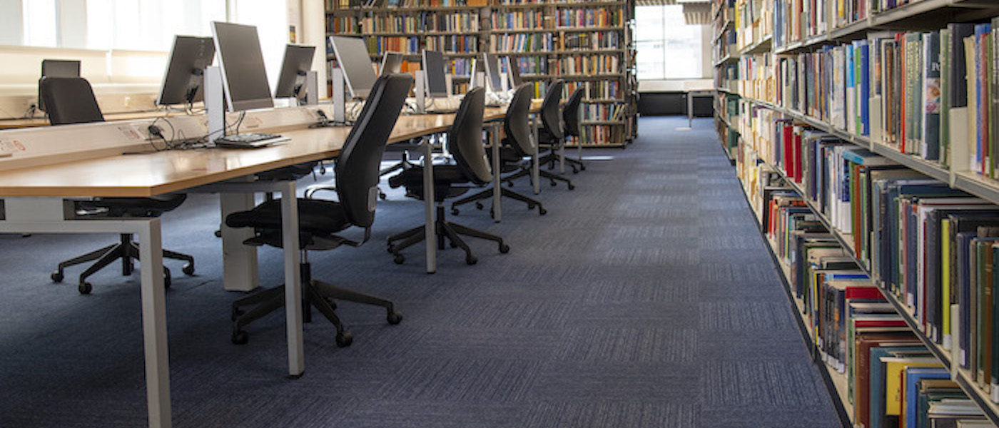 Desks and bookshelves in the Main Library.