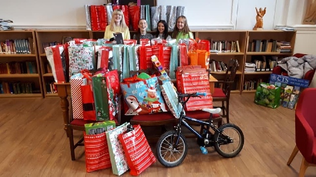 UofG Student Pastoral Planning Team SPPT members collecting gifts for Christmas 2019