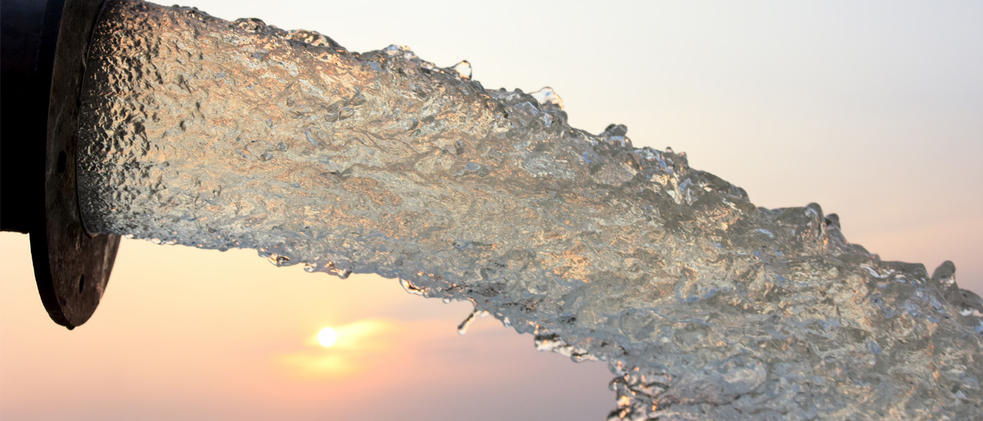 Water gushing from a pipe