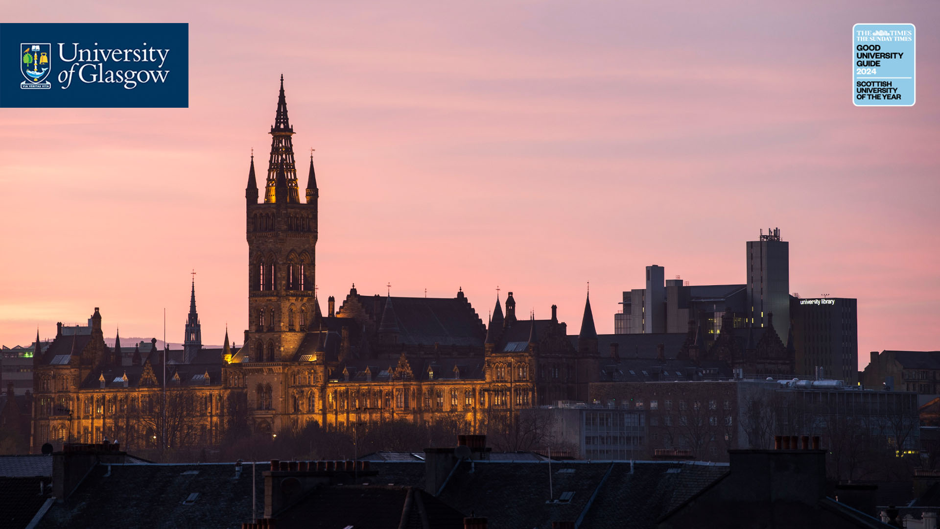 The Gilbert Scott Building in front of a pink sky