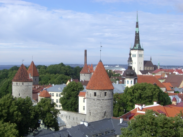 Towers with spires and sky