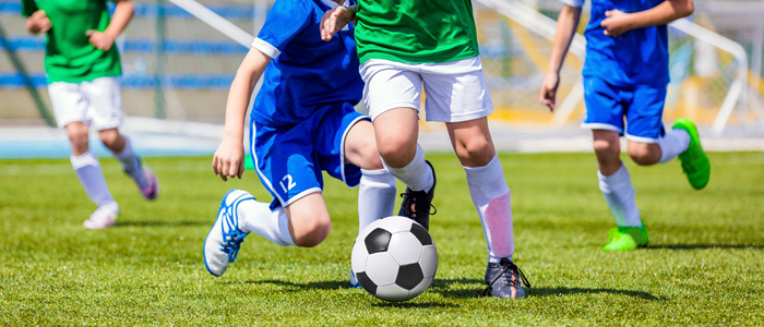 Photo of men playing football