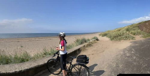 Photo of Katie Gallacher on a bike