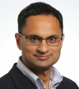 A head and shoulders shot of Professor Neil Basu