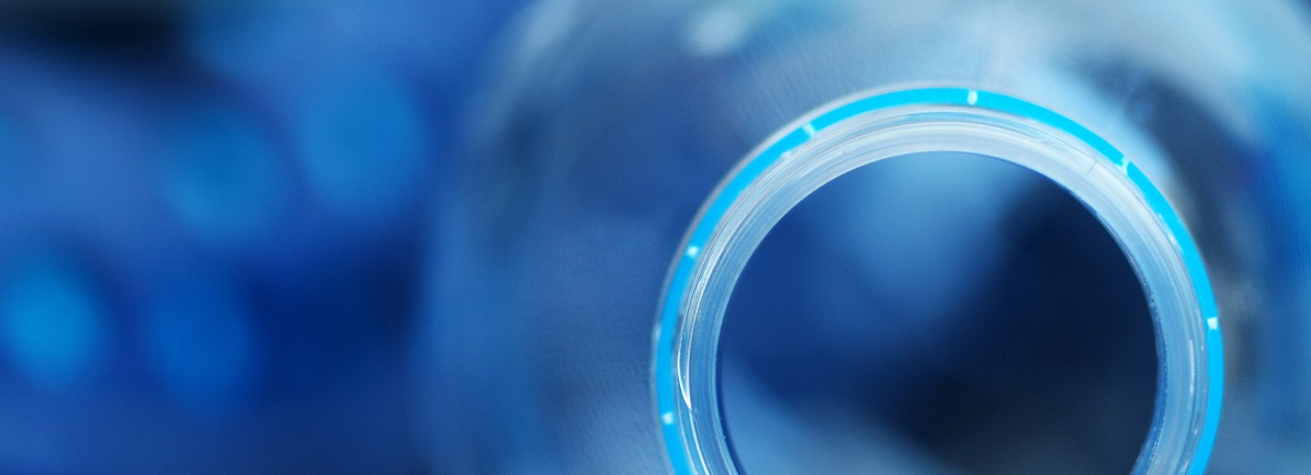 Abstract image looking down on glass bottle