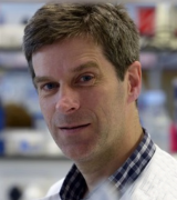 A head and shoulders shot of Professor Gerry Graham in the lab