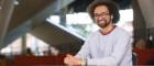 Dwayne Spirteri, a Research Associate at the University of Glasgow, who helped advise on the development of the James McCune Smith PhD Scholarship programme, is photographed in the University’s flagship James McCune Smith Learning Hub. Credit University of Glasgow.