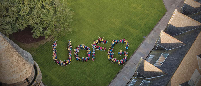 Photo of University of Glasgow quadrangle from above with large lettering U of G