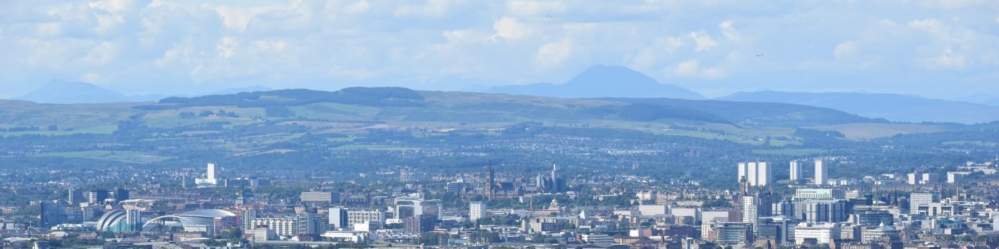 Cityscape with hills in background