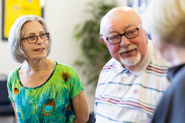 A group of older adults chatting