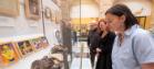 Dr Cheryl McGeachan, Dr Anthony Lewis and Claire Coia inspect the Art Extraordinary display at Kelvingrove Art Gallery and Museum 