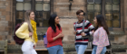 students chatting on campus