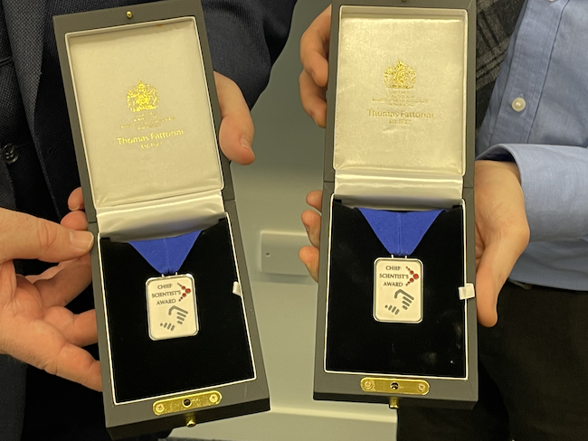 Dr David Mahon receives the National Nuclear Laboratory’s Chief Scientist’s Award & Medal from NNL's University Lead Nick Smith.