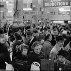 Photograph of customers browsing the sale items during the winter sale, c1960.  (GUAS Ref: HF 51/6/1/5/3 photo 1. Copyright reserved.)