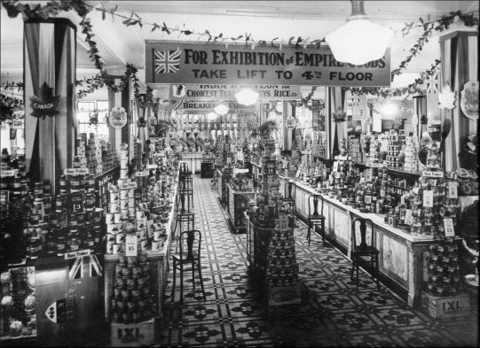 Photograph of a view of the Grocery Section in the Food Hall, taken from the Kensington High Street entrance, June 1929.  (GUAS Ref: HF 51/8/1/1/3 photo 16. Copyright reserved.)