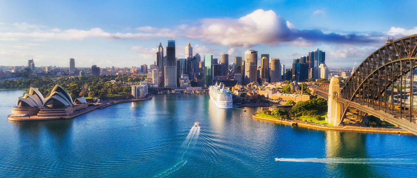 View of the Opera House and Sydney Harbour Bridge with the Central Business District skyscrapers in the background