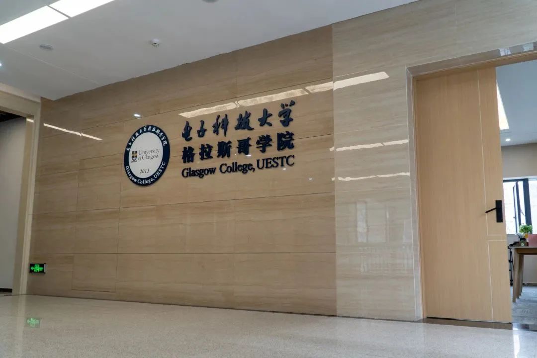 New office building with Glasgow College logo on wall