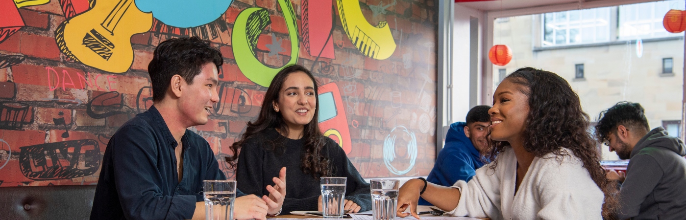 Students in sound bite restaurant in the Queen Margaret Union 