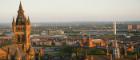 University Building in the forefront, city of Glasgow skyline behind